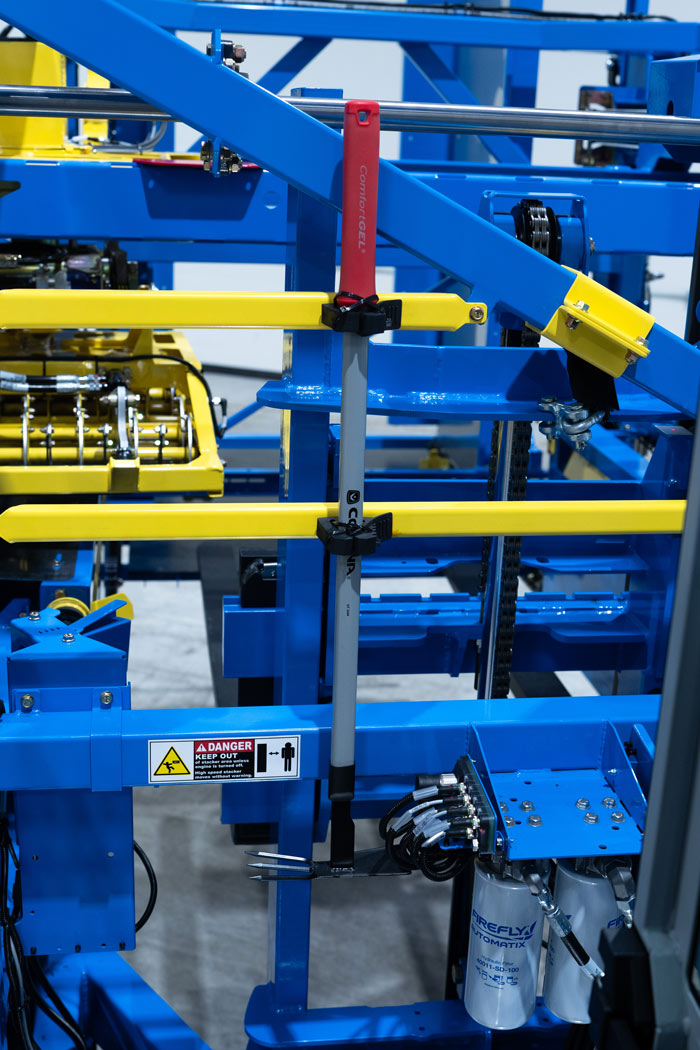 Multi-tool on built-in bracket on ProSlab 165 harvester