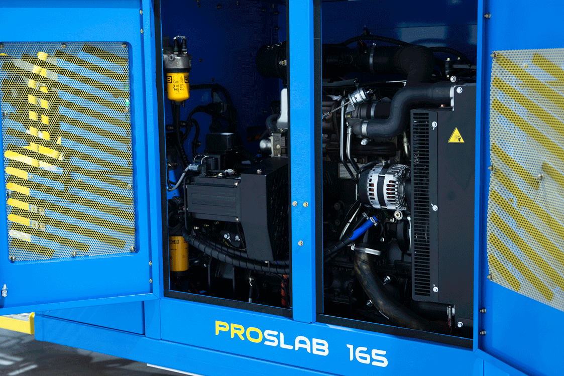 Close up of a FireFly Automatix ProSlab 165 turf harvester with engine compartment doors open, showing TorqueSync generator system and engine.