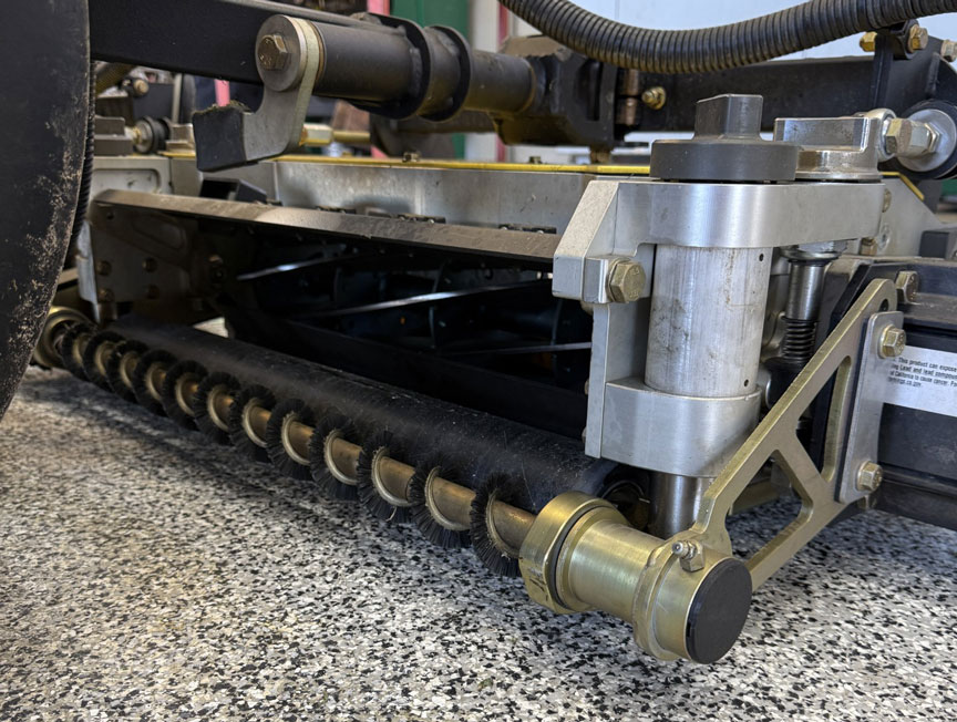 Close up of reel cutting unit with Active Roller Brush installed.