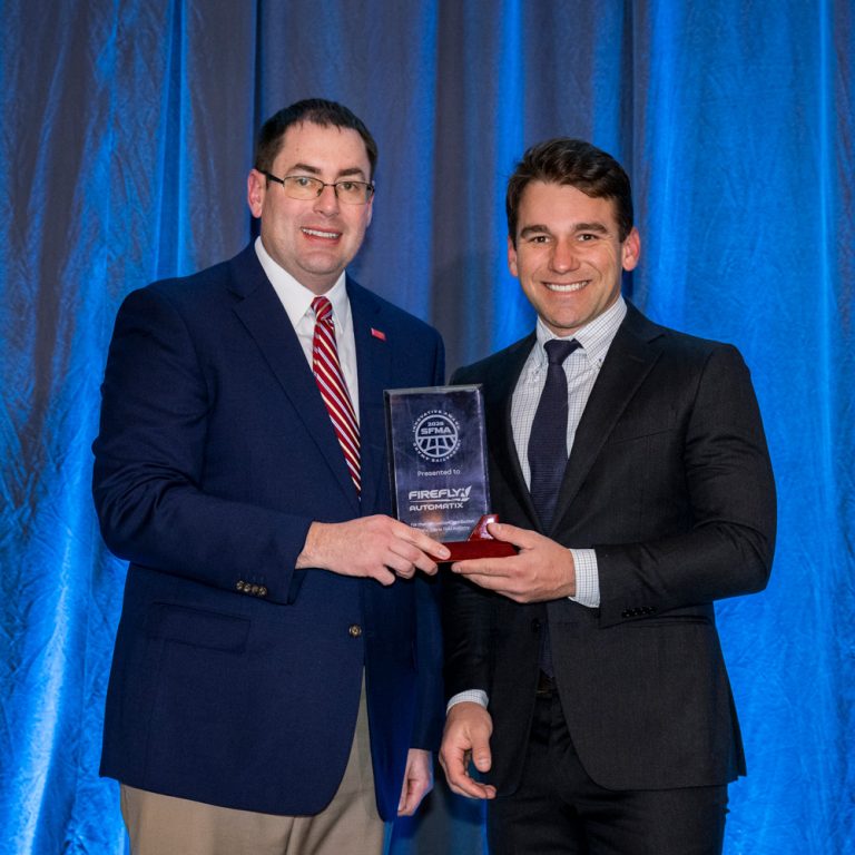 Mark LeBlanc accepting SFMA 2026 Innovative Award on behalf of FireFly Automatix